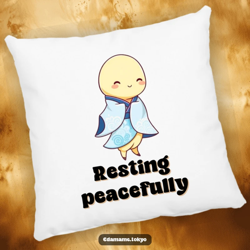 Funny Edamame pod wearing a flowing blue and white kimono, swaying gracefully, depicted on a decorative pillow, offering serene humor.